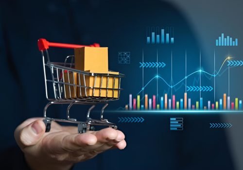 businessman holding shopping cart with boxes sales charts 72572 7651 (1)